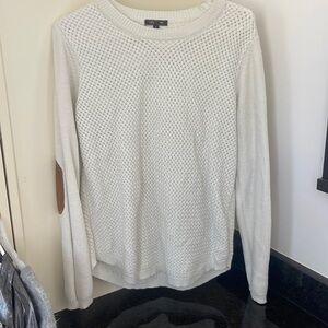 Cream sweater with brown elbows